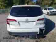 2021 Honda Pilot Black Edition z VIN 5FNYF6H73MB042188, wystawiony jako IAAI lot #43437463 z przebiegiem Nie podano mil oraz . Historia ofert i sprzedaży dostępna na DreamBid. Obrazek 17.