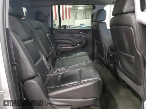 2015 Chevrolet Suburban LT с VIN 1GNSKJKCXFR300348, выставлен на аукционе Copart как лот 82416055 с пробегом 140 250 миль миль и Списание • Salvage title. История ставок и продаж доступна на DreamBid. Изображение 11.