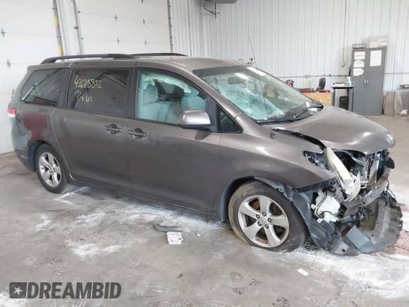 2014 Toyota Sienna LE AAS with VIN 5TDKK3DC5ES416638, listed as a IAAI auction lot 42685892 with 202,889 mi miles and . Bid and sale history available at DreamBid. Image 1.