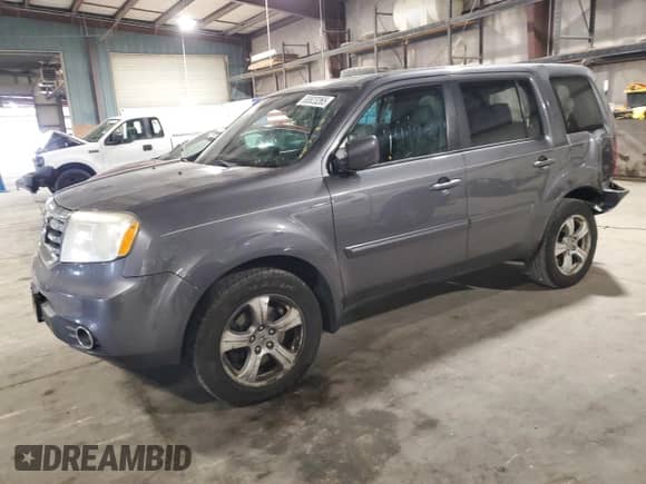 2014 Honda Pilot EX-L with VIN 5FNYF4H57EB008792, listed as a Copart auction lot 80823265 with 208,875 mi miles and Salvage title. Bid and sale history available at DreamBid. Image 1.