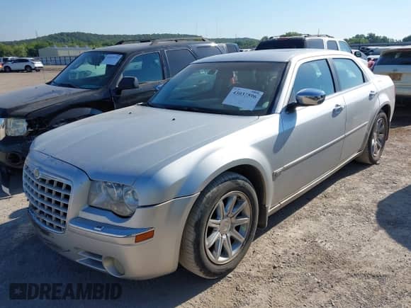 2005 Chrysler 300 C with VIN 2C3AA63H45H521896, listed as a IAAI auction lot 43037596 with 228,884 mi miles and . Bid and sale history available at DreamBid. Image 2.