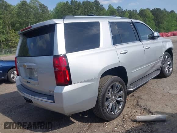 2017 Chevrolet Tahoe Premier with VIN 1GNSKCKC1HR335276, listed as a IAAI auction lot 42084548 with 191,627 mi miles and . Bid and sale history available at DreamBid. Image 4.