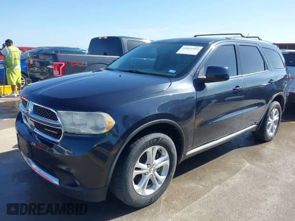 2013 Dodge Durango SXT with VIN 1C4RDHAGXDC680418, listed as a IAAI auction lot 42851105 with 149,216 mi miles and . Bid and sale history available at DreamBid. Image 17.