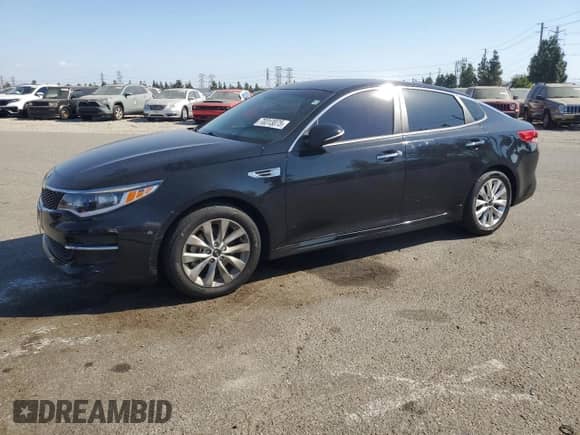 2018 Kia Optima LX with VIN 5XXGT4L3XJG258285, listed as a Copart auction lot 70313075 with 89,863 mi miles and Salvage title. Bid and sale history available at DreamBid. Image 1.