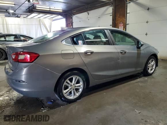 2018 Chevrolet Cruze LT with VIN 1G1BE5SM2J7221916, listed as a Copart auction lot 80075015 with 117,962 mi miles and Salvage title. Bid and sale history available at DreamBid. Image 3.