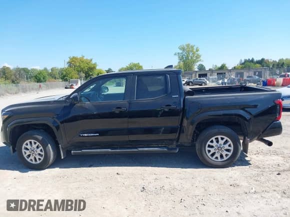 2024 Toyota Tacoma SR5 with VIN 3TMLB5JN4RM068147, listed as a IAAI auction lot 43177753 with 15,469 mi miles and . Bid and sale history available at DreamBid. Image 14.