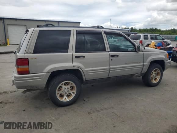 1997 Jeep Grand Cherokee Limited с VIN 1J4GZ78S9VC623295, выставлен на аукционе Copart как лот 58552495 с пробегом 197 818 миль миль и Чистый • Clean title. История ставок и продаж доступна на DreamBid. Изображение 3.