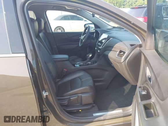 2023 Chevrolet Equinox Premier z VIN 3GNAXXEG1PL181676, wystawiony jako IAAI lot #42396514 z przebiegiem 57 855 mil mil oraz . Historia ofert i sprzedaży dostępna na DreamBid. Obrazek 5.