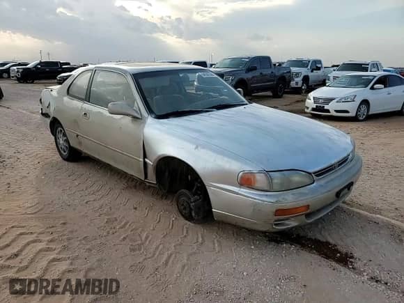 1995 Toyota Camry LE z VIN 4T1SK12C7SU548827, wystawiony jako Copart lot #64502944 z przebiegiem 215 266 mil mil oraz Szkoda całkowita • Salvage title. Historia ofert i sprzedaży dostępna na DreamBid. Obrazek 11.