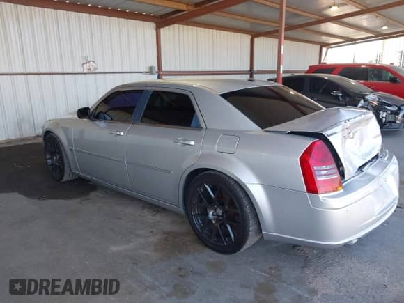 2006 Chrysler 300 C SRT-8 with VIN 2C3LA73W26H471000, listed as a IAAI auction lot 42884335 with 148,180 mi miles and . Bid and sale history available at DreamBid. Image 3.