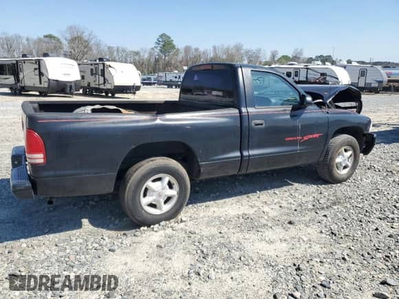 1997 Dodge Dakota с VIN 1B7FL26X0VS281035, выставлен на аукционе Copart как лот 49687855 с пробегом 267 422 миль миль и Списание • Salvage title. История ставок и продаж доступна на DreamBid. Изображение 3.