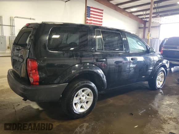 2004 Dodge Durango ST with VIN 1D4HB38N44F212999, listed as a Copart auction lot 55525765 with 130,806 mi miles and Salvage title. Bid and sale history available at DreamBid. Image 3.