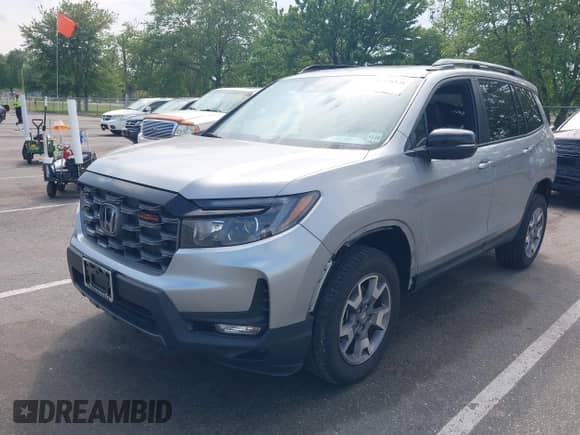 2023 Honda Passport TrailSport с VIN 5FNYF8H68PB043019, выставлен на аукционе IAAI как лот 42456931 с пробегом 7 311 миль миль и . История ставок и продаж доступна на DreamBid. Изображение 2.