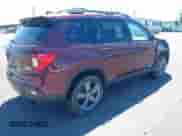 2021 Honda Passport Touring with VIN 5FNYF8H95MB036020, listed as a IAAI auction lot 42343633 with 74,778 mi miles and . Bid and sale history available at DreamBid. Image 4.