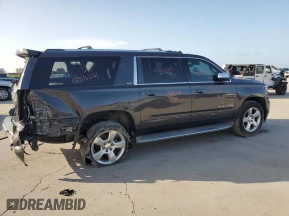 2015 Chevrolet Suburban LTZ с VIN 1GNSCKKC4FR554396, выставлен на аукционе Copart как лот 53851515 с пробегом 244 587 миль миль и Списание • Salvage title. История ставок и продаж доступна на DreamBid. Изображение 3.
