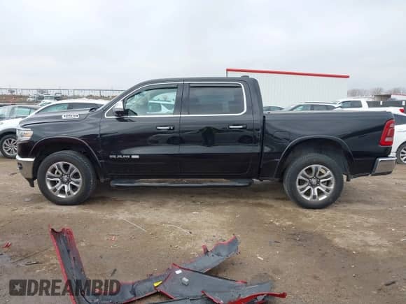 2019 Ram 1500 Longhorn with VIN 1C6SRFKT7KN518337, listed as a IAAI auction lot 41502569 with 76,226 mi miles and . Bid and sale history available at DreamBid. Image 14.