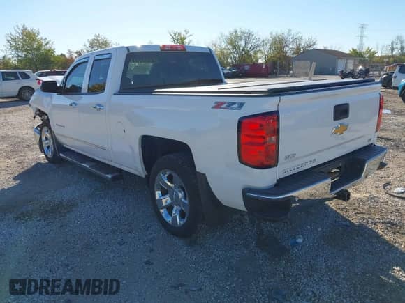 2014 Chevrolet Silverado 1500 LTZ with VIN 1GCVKSEC6EZ253146, listed as a IAAI auction lot 43368232 with 136,880 mi miles and . Bid and sale history available at DreamBid. Image 3.