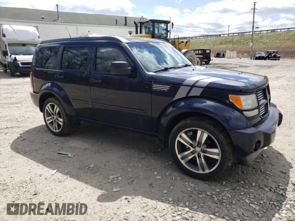 2011 Dodge Nitro Shock с VIN 1D4PU7GX1BW527188, выставлен на аукционе Copart как лот 52320435 с пробегом 122 873 миль миль и Списание • Salvage title. История ставок и продаж доступна на DreamBid. Изображение 4.