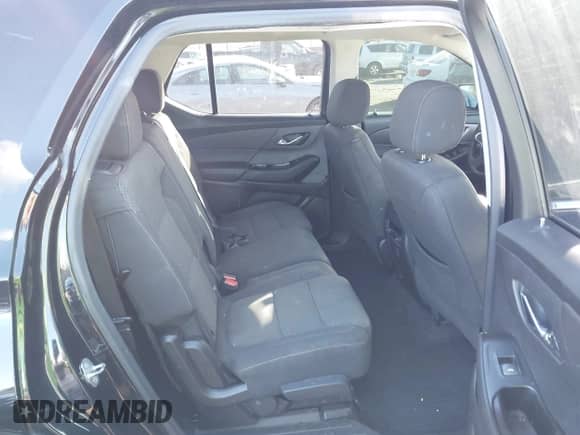 2019 Chevrolet Traverse LS with VIN 1GNERFKW4KJ275911, listed as a IAAI auction lot 43424478 with 137,381 mi miles and . Bid and sale history available at DreamBid. Image 8.