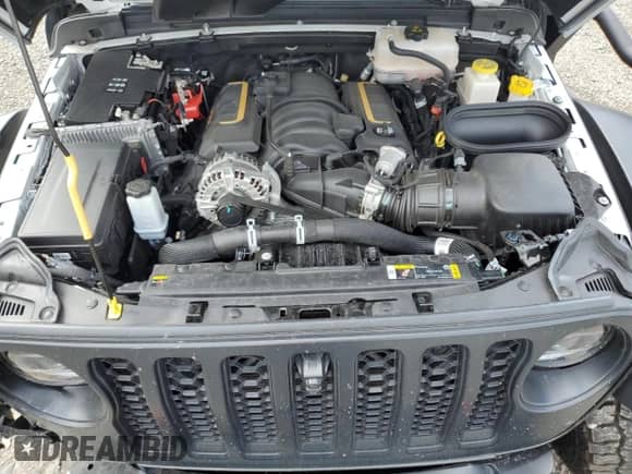 2023 Jeep Wrangler Rubicon 20th Anniversary with VIN 1C4JJXSJ3PW642395, listed as a Copart auction lot 67934925 with 21,587 mi miles and Salvage title. Bid and sale history available at DreamBid. Image 12.