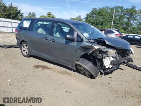 2012 Toyota Sienna with VIN 5TDZK3DC4CS184450, listed as a Copart auction lot 71284385 with 207,878 mi miles and Salvage title. Bid and sale history available at DreamBid. Image 4.