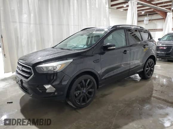 2017 Ford Escape Titanium с VIN 1FMCU9JD2HUD17267, выставлен на аукционе Copart как лот 86828485 с пробегом 72 989 миль миль и Списание • Salvage title. История ставок и продаж доступна на DreamBid. Изображение 1.
