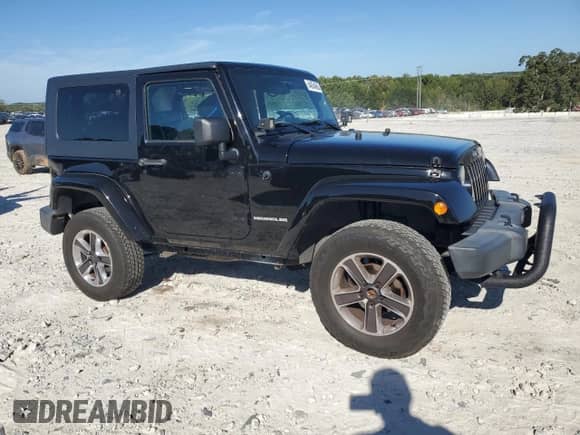 2010 Jeep Wrangler Sahara с VIN 1J4AA5D15AL152772, выставлен на аукционе Copart как лот 84934065 с пробегом 158 263 миль миль и Списание • Salvage title. История ставок и продаж доступна на DreamBid. Изображение 4.