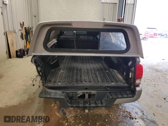 2019 Toyota Tacoma SR5 с VIN 3TMDZ5BN7KM070608, выставлен на аукционе Copart как лот 80529235 с пробегом 92 918 миль миль и Списание • Salvage title. История ставок и продаж доступна на DreamBid. Изображение 6.