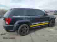 2008 Jeep Grand Cherokee SRT-8 with VIN 1J8HR78398C214004, listed as a Copart auction lot 48760375 with 165,318 mi miles and Salvage title. Bid and sale history available at DreamBid. Image 3.