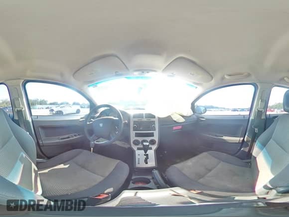 2009 Dodge Caliber SXT with VIN 1B3HB48A89D224125, listed as a Copart auction lot 61968005 with 241,959 mi miles and Salvage title. Bid and sale history available at DreamBid. Image 14.