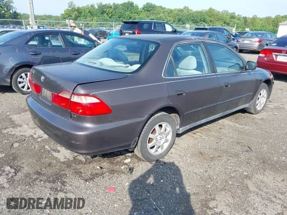 1999 Honda Accord LX with VIN 1HGCG6654XA100896, listed as a IAAI auction lot 42613354 with 154,176 mi miles and . Bid and sale history available at DreamBid. Image 4.