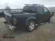 2007 Nissan Frontier LE with VIN 1N6AD07W17C401906, listed as a Copart auction lot 49831275 with 137,696 mi miles and Salvage title. Bid and sale history available at DreamBid. Image 3.