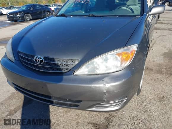 2004 Toyota Camry LE z VIN 4T1BE32K14U850479, wystawiony jako IAAI lot #43493027 z przebiegiem 185 594 mil mil oraz . Historia ofert i sprzedaży dostępna na DreamBid. Obrazek 6.