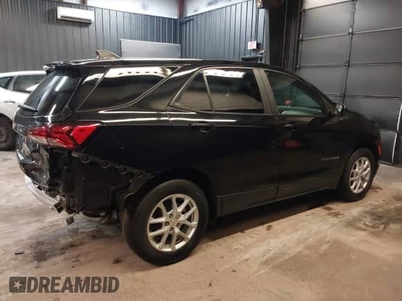 2023 Chevrolet Equinox LS z VIN 3GNAXSEG3PL272628, wystawiony jako IAAI lot #42452143 z przebiegiem 22 427 mil mil oraz . Historia ofert i sprzedaży dostępna na DreamBid. Obrazek 4.