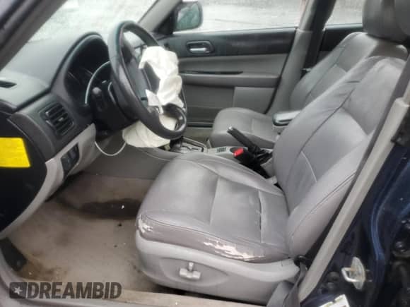 2006 Subaru Forester X with VIN JF1SG65606H745030, listed as a Copart auction lot 82445575 with Not provided miles and Salvage title. Bid and sale history available at DreamBid. Image 7.