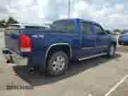 2013 GMC Sierra 1500 SLT с VIN 3GTP2WE74DG227727, выставлен на аукционе Copart как лот 64008714 с пробегом 168 719 миль миль и Списание • Salvage title. История ставок и продаж доступна на DreamBid. Изображение 3.