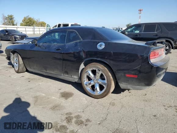 2013 Dodge Challenger R/T Plus z VIN 2C3CDYBT7DH501626, wystawiony jako Copart lot #81967985 z przebiegiem 226 092 mil mil oraz Szkoda całkowita • Salvage title. Historia ofert i sprzedaży dostępna na DreamBid. Obrazek 2.