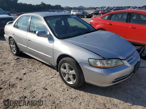 2002 Honda Accord LX with VIN 1HGCG16422A038109, listed as a Copart auction lot 80821885 with 169,787 mi miles and Salvage title. Bid and sale history available at DreamBid. Image 4.