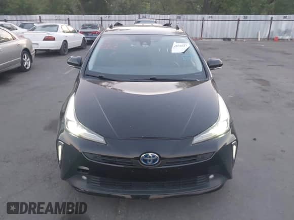 2022 Toyota Prius LE with VIN JTDKAMFU9N3159872, listed as a IAAI auction lot 42850013 with 49,455 mi miles and . Bid and sale history available at DreamBid. Image 11.