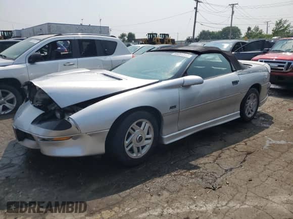 1996 Chevrolet Camaro with VIN 2G1FP32K2T2158759, listed as a Copart auction lot 60891383 with 147,294 mi miles and Salvage title. Bid and sale history available at DreamBid. Image 1.