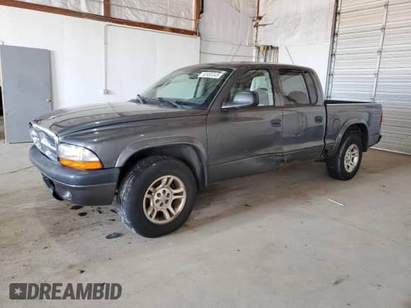2004 Dodge Dakota Sport z VIN 1D7HL38N54S536938, wystawiony jako Copart lot #52455345 z przebiegiem 157 791 mil mil oraz Szkoda całkowita • Salvage title. Historia ofert i sprzedaży dostępna na DreamBid. Obrazek 1.