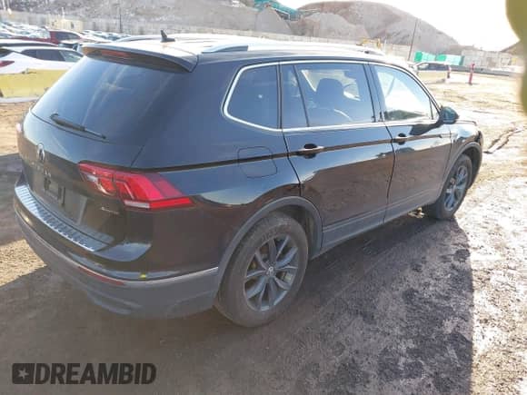 2023 Volkswagen Tiguan SE with VIN 3VVMB7AX8PM032557, listed as a IAAI auction lot 41585975 with 28,706 mi miles and . Bid and sale history available at DreamBid. Image 4.