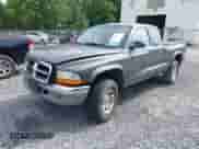 2001 Dodge Dakota with VIN 1B7GG22X21S299349, listed as a IAAI auction lot 42622415 with 92,940 mi miles and . Bid and sale history available at DreamBid. Image 2.