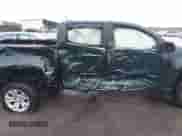 2015 Chevrolet Colorado 2WD LT z VIN 1GCGSBEAXF1181262, wystawiony jako IAAI lot #42418456 z przebiegiem 137 819 mil mil oraz . Historia ofert i sprzedaży dostępna na DreamBid. Obrazek 6.