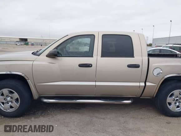 2005 Dodge Dakota SLT with VIN 1D7HE48N45S337753, listed as a IAAI auction lot 41084928 with 177,018 mi miles and . Bid and sale history available at DreamBid. Image 13.