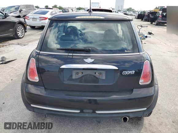 2005 MINI Hardtop with VIN WMWRC335X5TK63333, listed as a Copart auction lot 56488415 with 166,588 mi miles and Salvage title. Bid and sale history available at DreamBid. Image 6.
