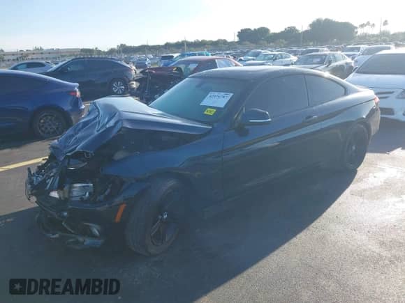 2015 BMW 4 Series 428i with VIN WBA3N3C58FK232704, listed as a IAAI auction lot 42976787 with 89,666 mi miles and . Bid and sale history available at DreamBid. Image 2.