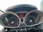 2012 Ford Fiesta SE с VIN 3FADP4EJ9CM102104, выставлен на аукционе Copart как лот 80645345 с пробегом 194 862 миль миль и Списание • Salvage title. История ставок и продаж доступна на DreamBid. Изображение 9.