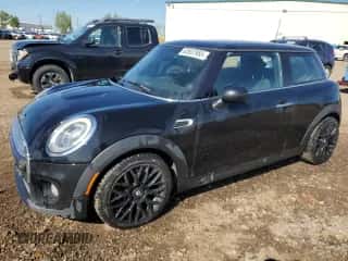 2014 MINI Hardtop with VIN WMWXM5C51ET731031, listed as a Copart auction lot 63807985 with 142,700 mi miles and Clean title. Bid and sale history available at DreamBid. Image 1.