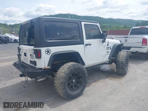 2012 Jeep Wrangler Sport с VIN 1C4AJWAG0CL289478, выставлен на аукционе IAAI как лот 41781118 с пробегом 127 299 миль миль и . История ставок и продаж доступна на DreamBid. Изображение 4.
